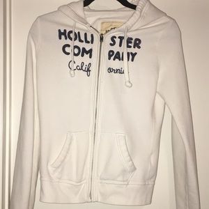 A white Hollister hoody